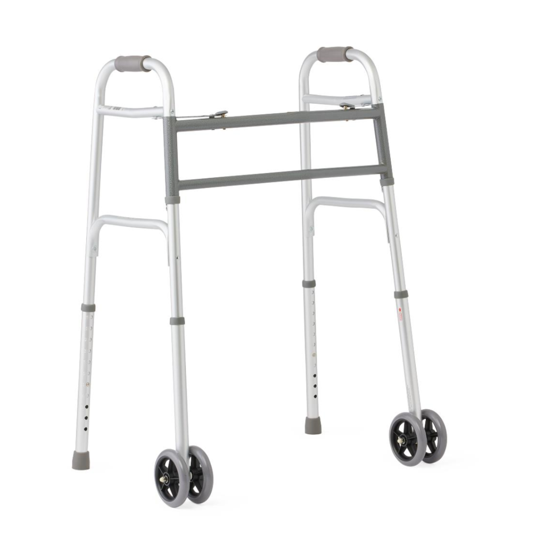 The Medline Bariatric Folding Walker with XL Wheels is a lightweight, silver walker featuring two front wheels, adjustable legs, an extra-wide frame, a grey horizontal support bar, padded hand grips, designed for high weight capacity and optimal mobility.